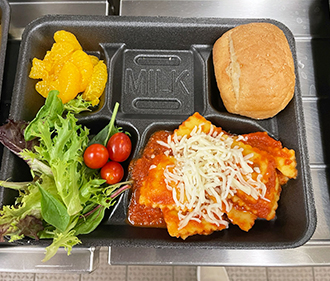 Staff members getting food for lunch